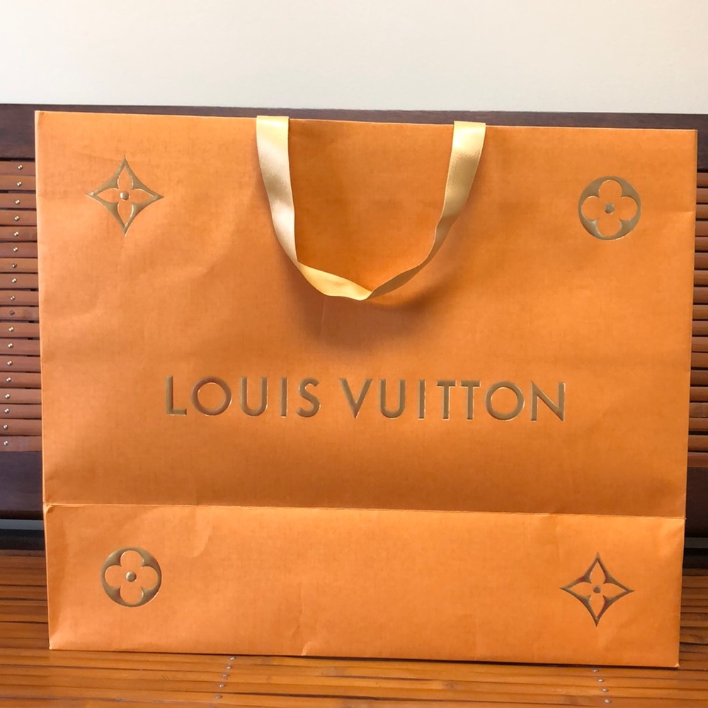 Louis Vuitton shopping bag. 19.5 in. X 16 in.  Ribbon handles